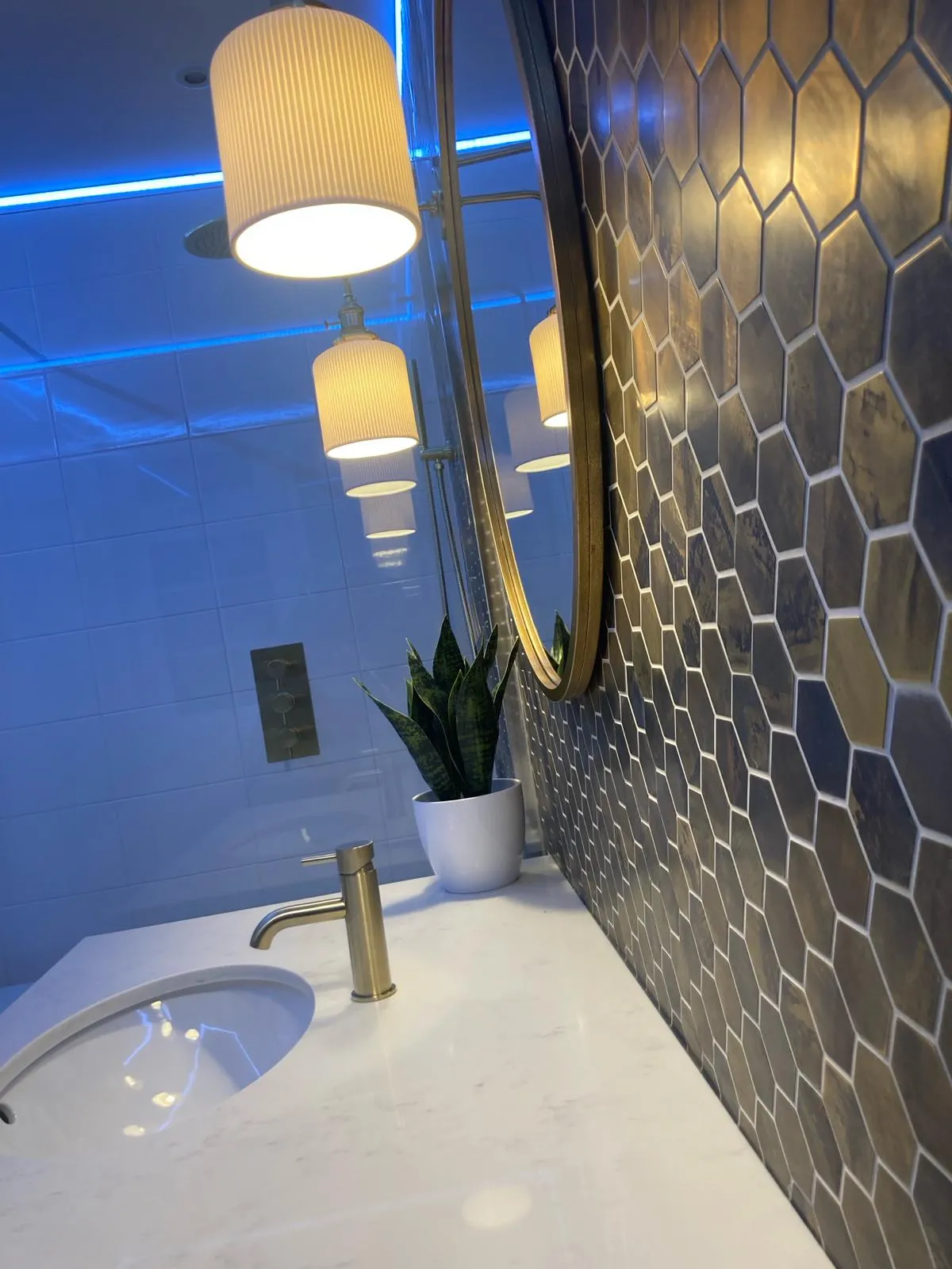 Bathroom light with a sink and a mirror.